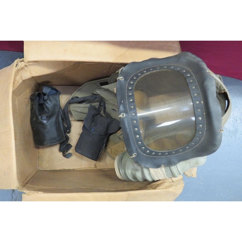 265 - WW2 Baby's Respirator In Card Issue Box
green painted steel framework.  Front celluloid visor. ... 