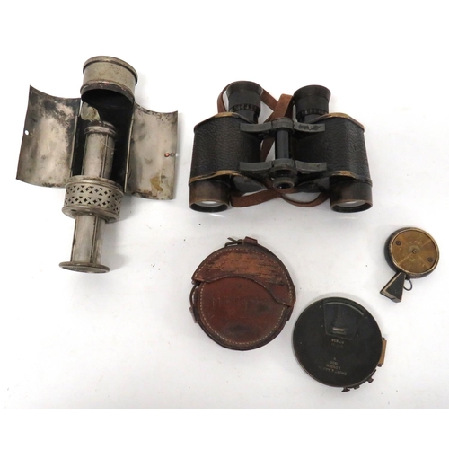 Four Items Of WW1 And Earlier Officer's Equipment
consisting Short & Mason 1900 pocket instrument.  Complete in leather case ... Pair of Bausch & Lomb field binoculars.  Large broad arrow stamps ... Weldon range finder ... White metal cylinder, trench candle holder and shield.  4 items.