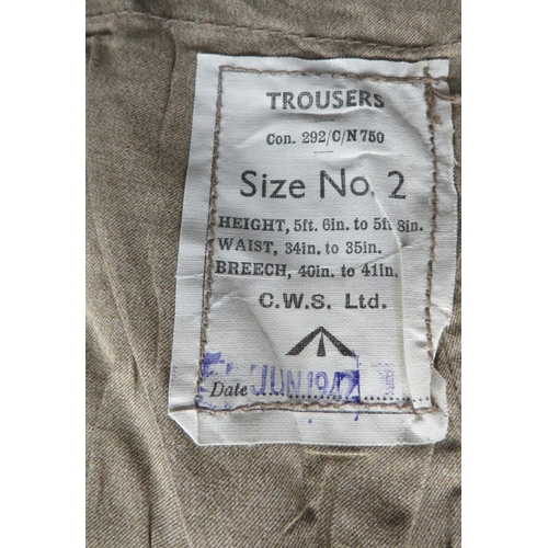 296 - WW2 Dated Khaki Over Trousers 
light khaki cotton, wide leg, over trousers.  Front of left leg with ... 