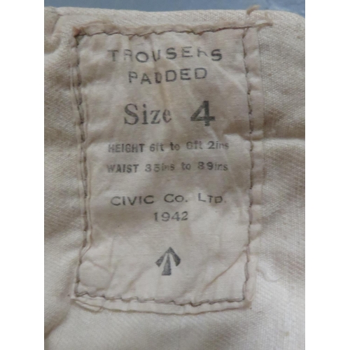 298 - WW2 Dated Winter Padded Over Trousers
green denim, padded, wide leg, over trousers.  Side slash pock... 