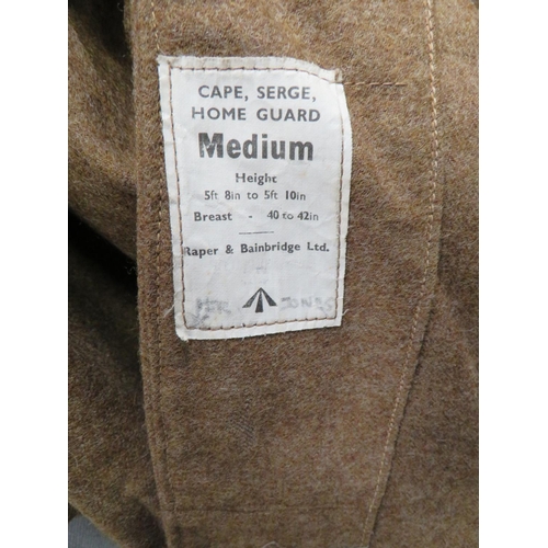 302 - Scarce Home Guard Woollen Cape
khaki woollen, sleeveless cape.  Large fold over collar.  T... 