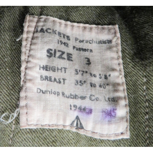 307 - 1945 Dated Parachutist's Jump Over Jacket
green denim, full front zip, sleeveless, over jacket. &nbs... 