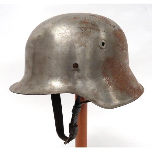 337 - German Third Reich Fire/Police Steel Helmet
polished steel, M42 raw edge crown.  Interior with ... 