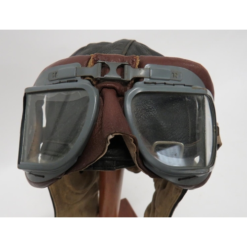 363 - Interwar Lewis Flying Helmet And MKVIII Goggles
black leather, multi panel helmet.  Press stud ... 