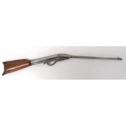 Late 19th Century German Gem Air Rifle
.25, 21 1/4 inch, part octagonal, hinged barrel.  Front blade sight.  Rear block V sight built into the barrel release catch.  Top of barrel marked "The Original Gem".  Steel spring housing body.  Lower steel cocking lever, trigger guard.  Polished wooden butt.  Heavy steel curved butt plate.  Barrel hinge screw loose.  