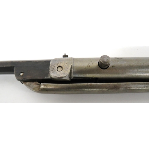 398 - Millita Registered Air Rifle Circa 1900
.177, 17 3/4 inch, blued hinged barrel.  Front blade si... 