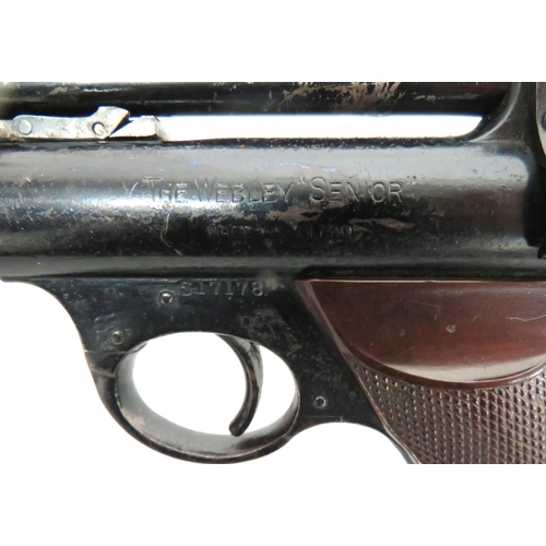 401 - Webley Senior Air Pistol
.22, 6 1/2 inch, blackened, lift up cocking barrel.  Front blade sight.  Re... 