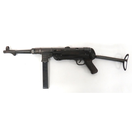 419 - Deactivated WW2 Dated German MP40 Sub Machine Gun
10 inch, 9mm, blued barrel.  Hooded front sig... 