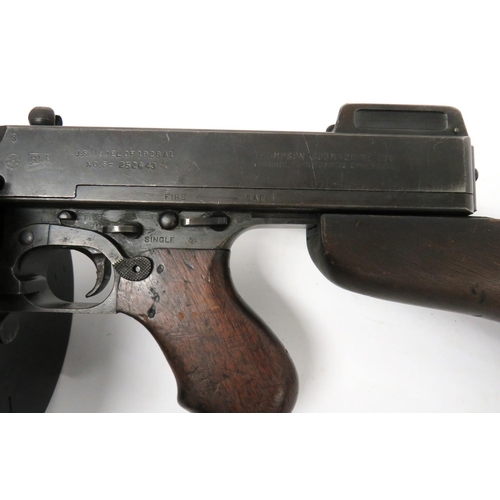 420 - Deactivated US Model 1928 A1 Thompson SMG
13 inch, .45 ACP, finned barrel with end Cutts compensator... 