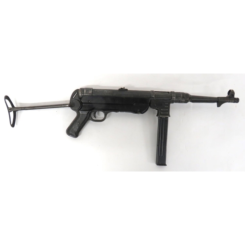 422 - Deactivated WW2 Dated German MP40 Sub Machine Gun
10 inch, 9 mm, blackened barrel.  Hooded fron... 