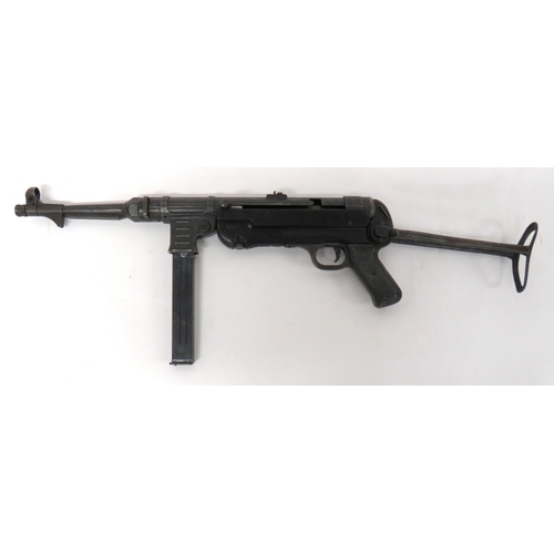 422 - Deactivated WW2 Dated German MP40 Sub Machine Gun
10 inch, 9 mm, blackened barrel.  Hooded fron... 