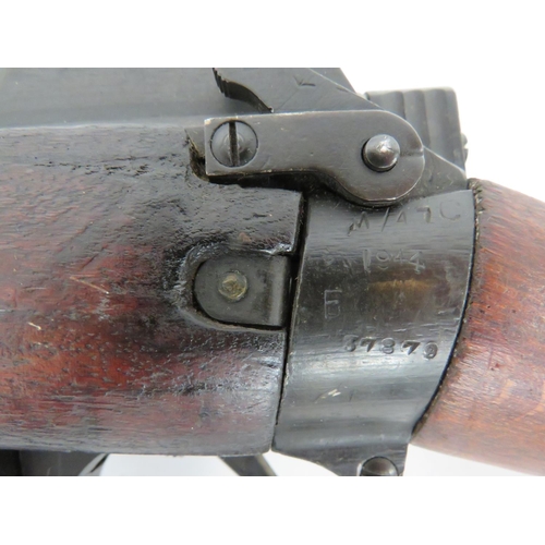 446 - Deactivated Enfield No 4 Rifle
.303, 25 inch barrel.  Front sight with protective ears.  Blackened b... 