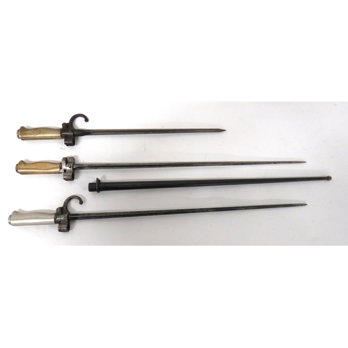 472 - Three French M1886 Lebel Bayonets
consisting M1886 example.  20 1/2 inch, cruciform blade. &nbs... 