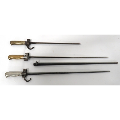 472 - Three French M1886 Lebel Bayonets
consisting M1886 example.  20 1/2 inch, cruciform blade. &nbs... 