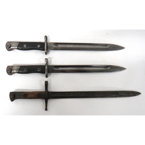 477 - Three Various Bayonets
consisting Italian M1891 Carcano bayonet.  11 1/2 inch, single edged bla... 