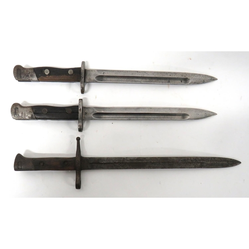 477 - Three Various Bayonets
consisting Italian M1891 Carcano bayonet.  11 1/2 inch, single edged bla... 