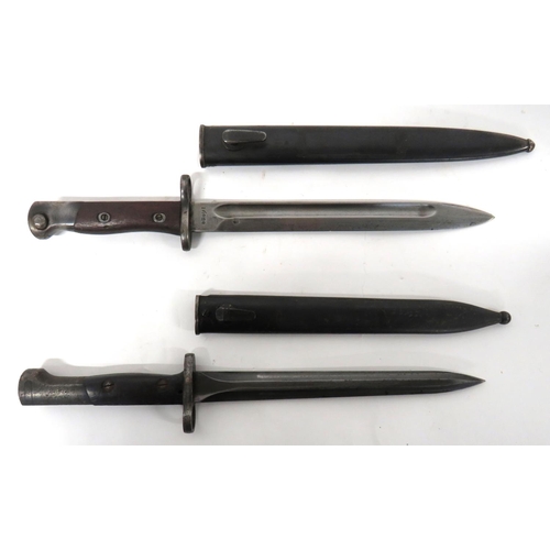 479 - Belgium FN1949 SLR Bayonet And Siamese Mauser Bayonet
Belgium FN example.  9 inch, double edged... 