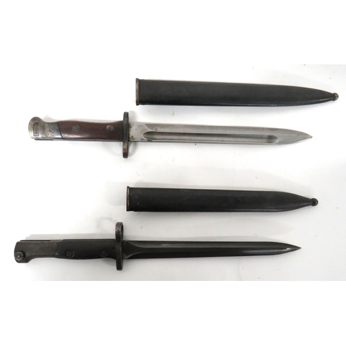 479 - Belgium FN1949 SLR Bayonet And Siamese Mauser Bayonet
Belgium FN example.  9 inch, double edged... 