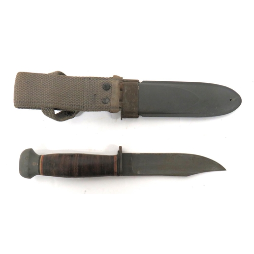 489 - American US Navy MKI Utility/Fighting Knife
5 inch, parkerised, single edge, clipped point blade. &n... 