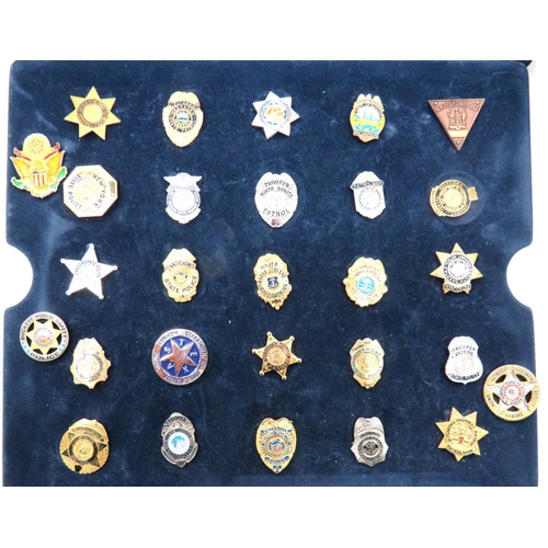 76 - Selection of Miniature American Police Badges
gilt and enamel lapel, miniature badges include Nebras... 