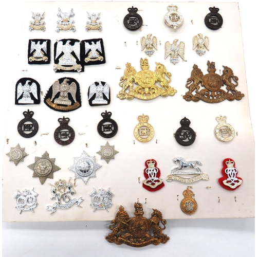 35 x Cavalry Cap And Collar Badges
cap include Royal Scots Greys ... Anodised Royal Scots Dragoon Guards ... Anodised QC 16th Queens Lancers ... Anodised Queens Own Hussars ... Anodised QC Life Guards ... Darkened QC Royal Horse Guards ... Brass KC Household Cavalry pouch badge.  35 items.