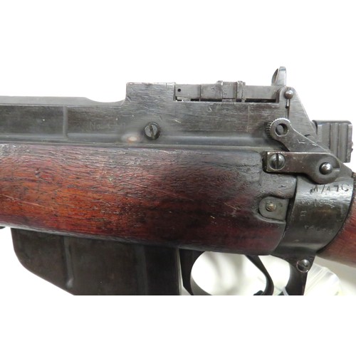 446 - Deactivated Enfield No 4 Rifle
.303, 25 inch barrel.  Front sight with protective ears.  Blackened b... 