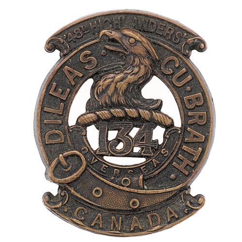 Badge. Canadian 134th (48th Toronto Highlanders) Bn. CEF WW1 glengarry badge.  Good scarce die-stamped bronze issue.    Loops.  GC