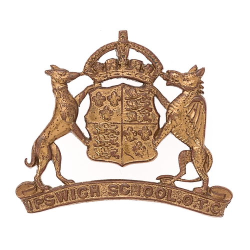 Badge. Ipswich School OTC Suffolk cap badge.  Good scarce die-stamped crowned Tudor Arms supported by Greyhound and Dragon on title scroll. (KK 2580)    Loops  VGC