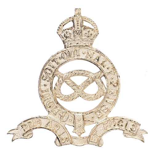 Badge. Queen's Own Royal Staffordshire Yeomanry pre 1953 Officer's cap badge.  Fine scarce die-cast silvered crowned Garter on bi-part arched scroll PRO ARIS ET FOCIS; Stafford Knot to voided centre.    Loops.  VGC