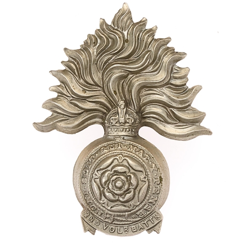 Badge. 2nd VB Royal Fusiliers (City of London Regiment) Edwardian cap badge circa 1901-08.  Good scarce die-stamped white metal flaming grenade, the ball embossed with crowned Garter and Rose; 2ND VOLR. BATTN scroll below.    Loops.  VGC