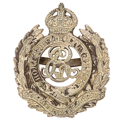 Badge. Royal Engineers Volunteers Edward VII cap badge circa 1901-08.  Good scarce die-stamped white metal crowned Garter resting in laurel sprays bearing scroll ROYAL ENGINEERS; EVIIR cypher to voided centre.    Blades.  Dirty but VGC