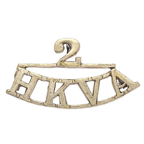 Badge. 2 / HKVA Hong Kong Volunteer Artillery Victorian shoulder title circa 1882-93.  Good scarce die-cast white metal.    Three loops.  VGC  Bob Betts Collection