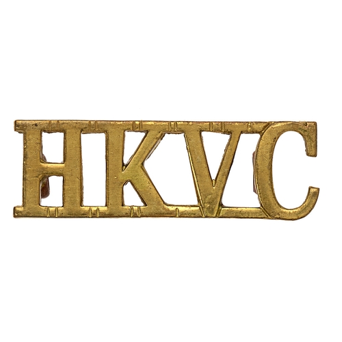 Badge. HKVC Hong Kong Volunteer Corps shoulder title circa 1908-19.  Good scarce die-cast brass.    Loops  VGC  Bob Betts Collection