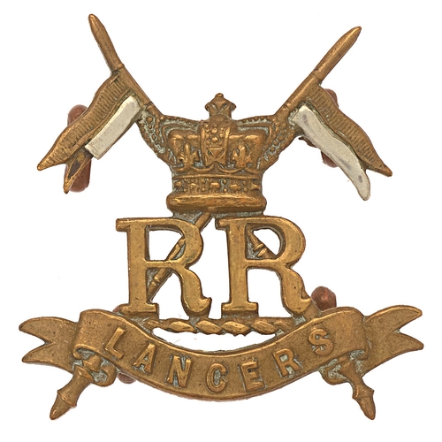 Badge. Boer War Her Majesty’s Reserve Regiment of Lancers cap badge.  Good scarce die-cast brass crowned RR on LANCERS scroll superimposed on crossed lancers with bi-metal pennons.    Four loops  VGC  HQ Ballincollig, Co. Cork. Formed February 1900; disbanded 14th May 1901. Gordon Dine Collection