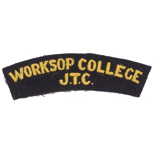 Badge. WORKSOP COLLEGE / JTC  cloth shoulder title circa 1940-48.  Good scarce golden yellow embroidered on black.      GC