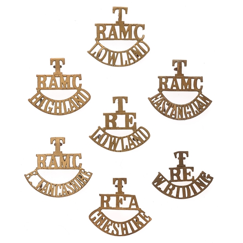 Badge. 7 Territorial T shoulder titles circa 1908-20.  T / RAMC / EAST ANGLIA ... T / RAMC / LOWLAND ... T / RAMC / HIGHLAND ... T / RAMC / E. LANCASHIRE ... T / RE / W. RIDING ... T / RE / LOWLAND ... T / RFA / CHESHIRE. All complete with loops.