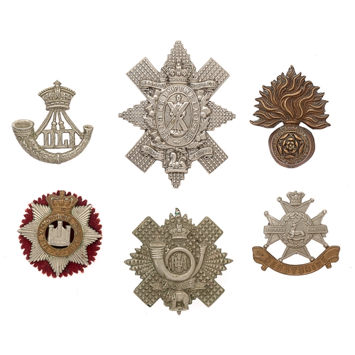 Badge. 6 Victorian Infantry cap badges.  Durham Light Infantry ... Royal Fusiliers ... Highland Light Infantry ... Derbyshire ... Devonshire ... Black Watch. All complete with loops.