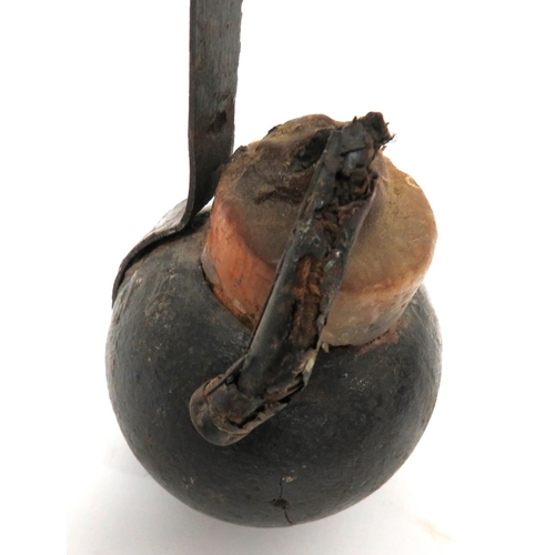 166 - WW1 Inert Austrian/German Ball Grenade
cast iron, ball body.  Central filling hole.  Rear ... 