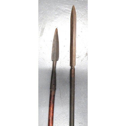 177 - Two 19th Century Spears
consisting an Indian example.  11 1/2 inch, double edged blade brazed i... 