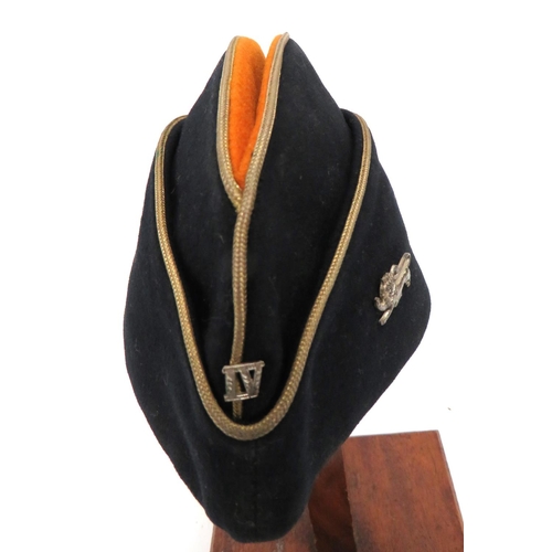 200 - Edwardian Kings Own Royal Regiment Officer's Torin Cap
orange crown.  Black body and curtain wi... 