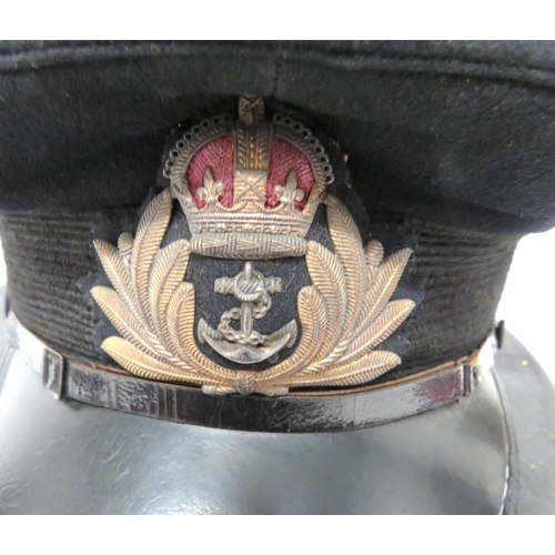 205 - WW2 Royal Navy Officer's Cap Complete In Transit Tin
black crown and body. Black patent peak and chi... 