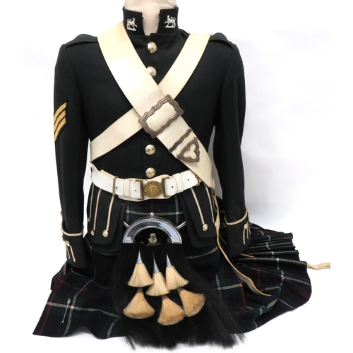 283 - Modern Gordon Highlanders Uniform
consisting dark green doublet with high collar.  Gauntlet cuf... 