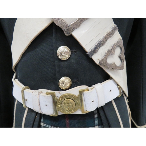 283 - Modern Gordon Highlanders Uniform
consisting dark green doublet with high collar.  Gauntlet cuf... 