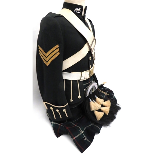 283 - Modern Gordon Highlanders Uniform
consisting dark green doublet with high collar.  Gauntlet cuf... 