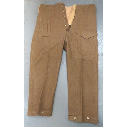 290 - Pair Of 1937 Pattern Battle Dress Trousers
khaki woollen, wide leg trousers.  Right hip with pl... 