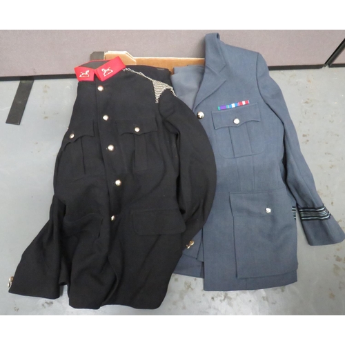 3rd Kings Own Hussars Patrol Tunic
dark blue, single breasted tunic.  High red collar with white metal horse collar badges.  Pleated chest pockets and lower hidden pockets.  Steel chain shoulder straps.  Anodised, plain buttons ... Similar blue patrol tunic ... 2 x black overall trousers with yellow side lines ... Post 1953 RAF Squadron Leader's service dress tunic.  Anodised QC RAF buttons.  