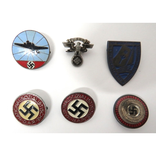 6 x Various Third Reich Badges
including 2 x alloy and painted NSDAP Party member badges ... White metal and enamel NSDAP cap cockade ... White metal and painted Frauen-Shaft Day badge ... White metal NSKK eagle badge.  6 items.