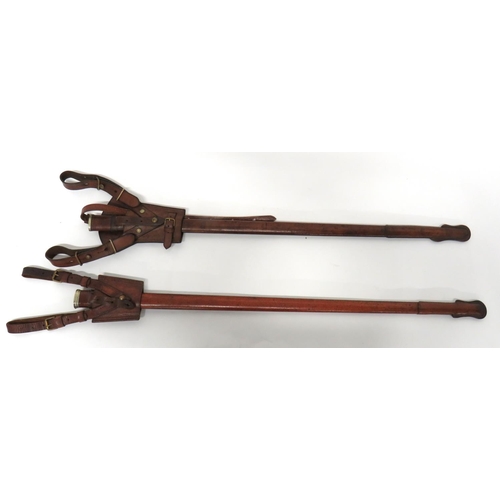 386 - Two 1897 Pattern Leather Field Scabbards
brown leather covered scabbard.  Both complete with br... 