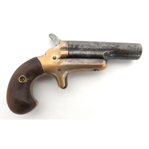 395 - Obsolete Calibre Colt Thuer Derringer
.41 RF cal, 2 1/2 inch barrel.  Top marked 