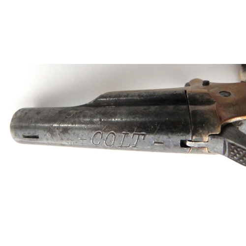 395 - Obsolete Calibre Colt Thuer Derringer
.41 RF cal, 2 1/2 inch barrel.  Top marked 